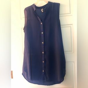 Long blue sleeveless blouse